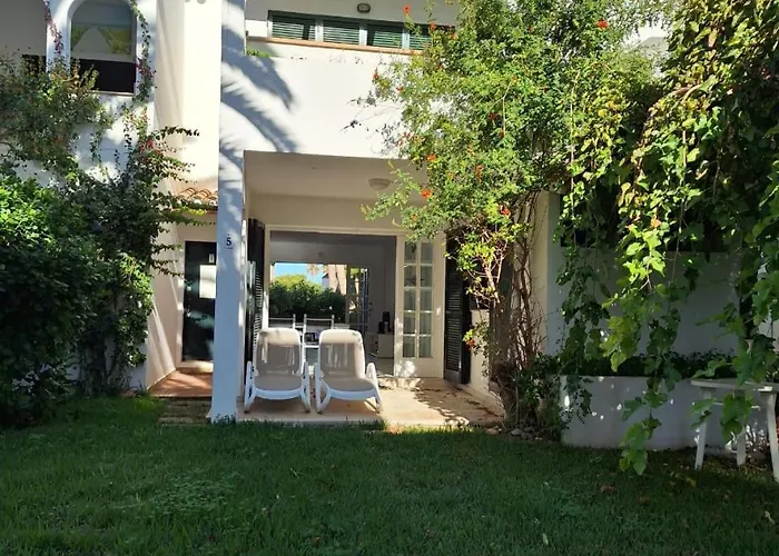 Playa Xoriguer Con Piscina Y Jardin דירה